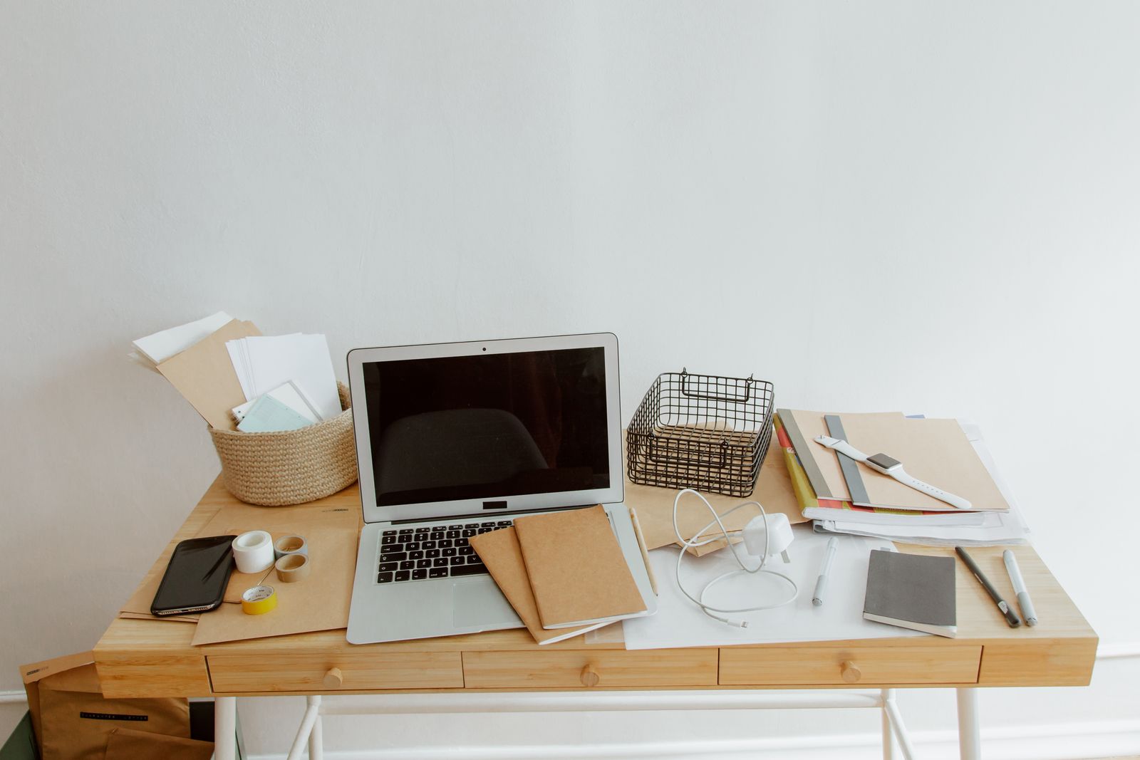 Website content notes and planning documents on a desk